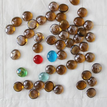 Play with glass marbles!