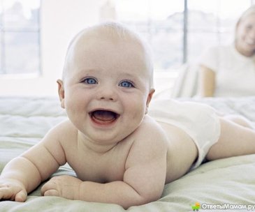 Help your baby learn to roll from back to tummy!