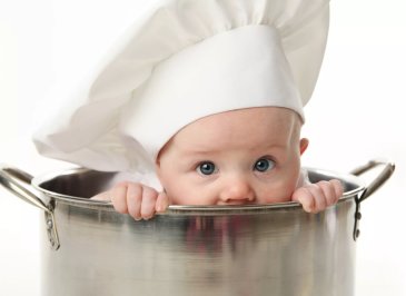 Offer your baby to play with a shiny pan