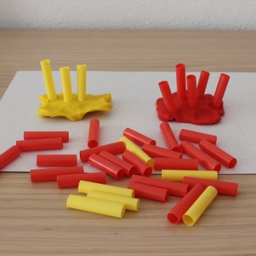 Offer your kid to play with plasticine and straws for a cocktail