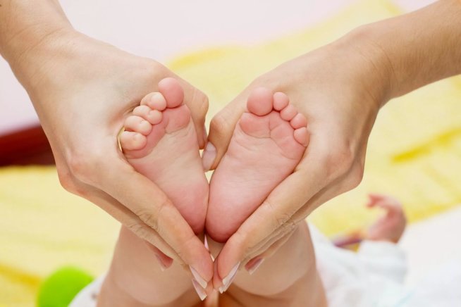 Give your little one a foot massage
