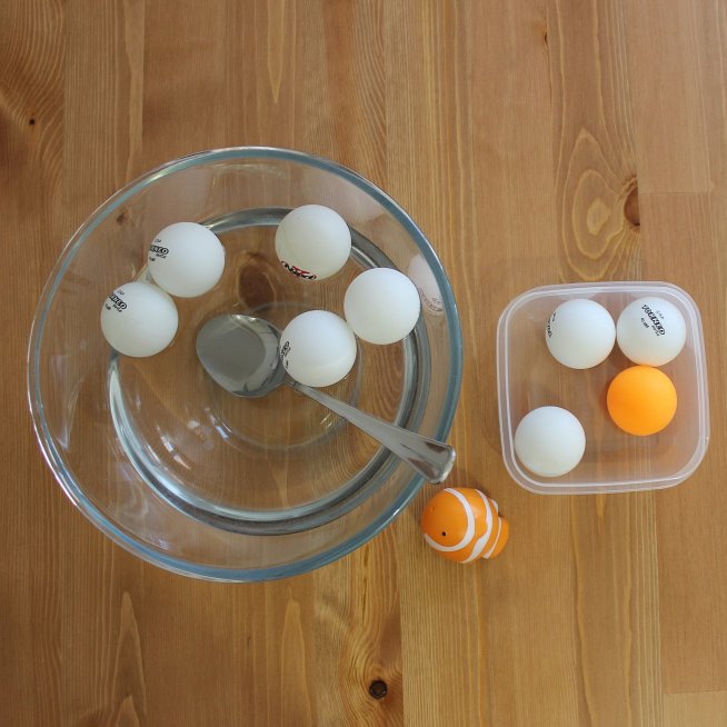 Play with water and ping-pong balls