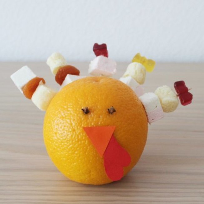 Make a turkey out of an orange with your kid