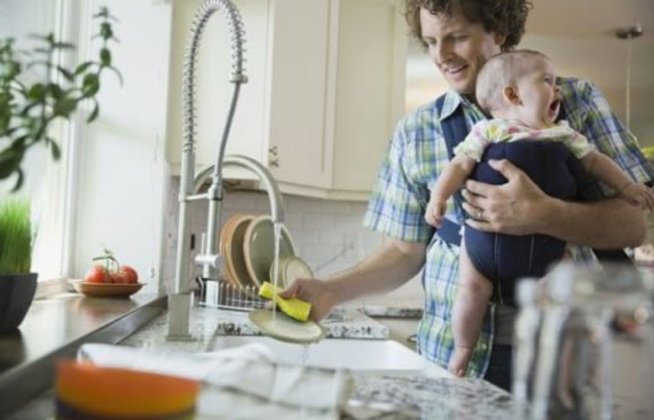 Wash the dishes holding your baby with one hand