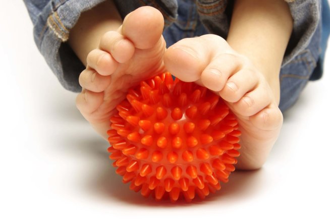 Give your kid a massage with prickly balls